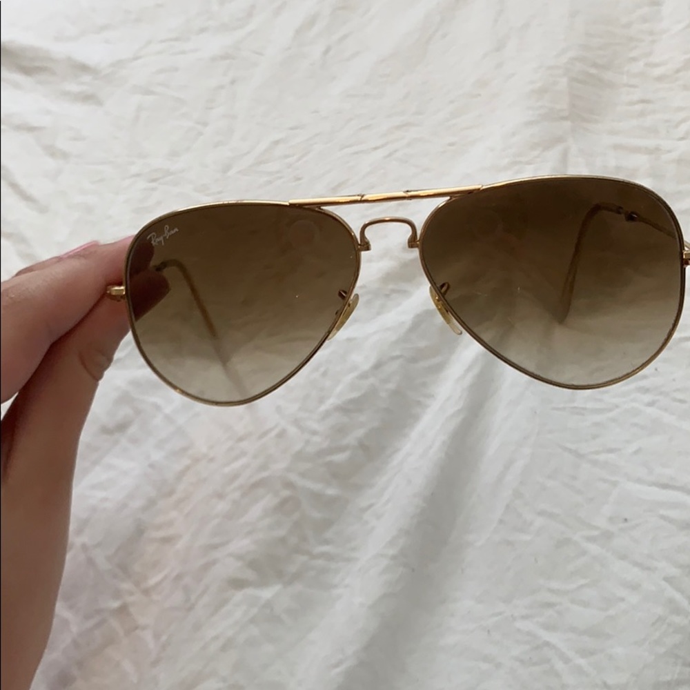 Gold ray bans with brown Lens